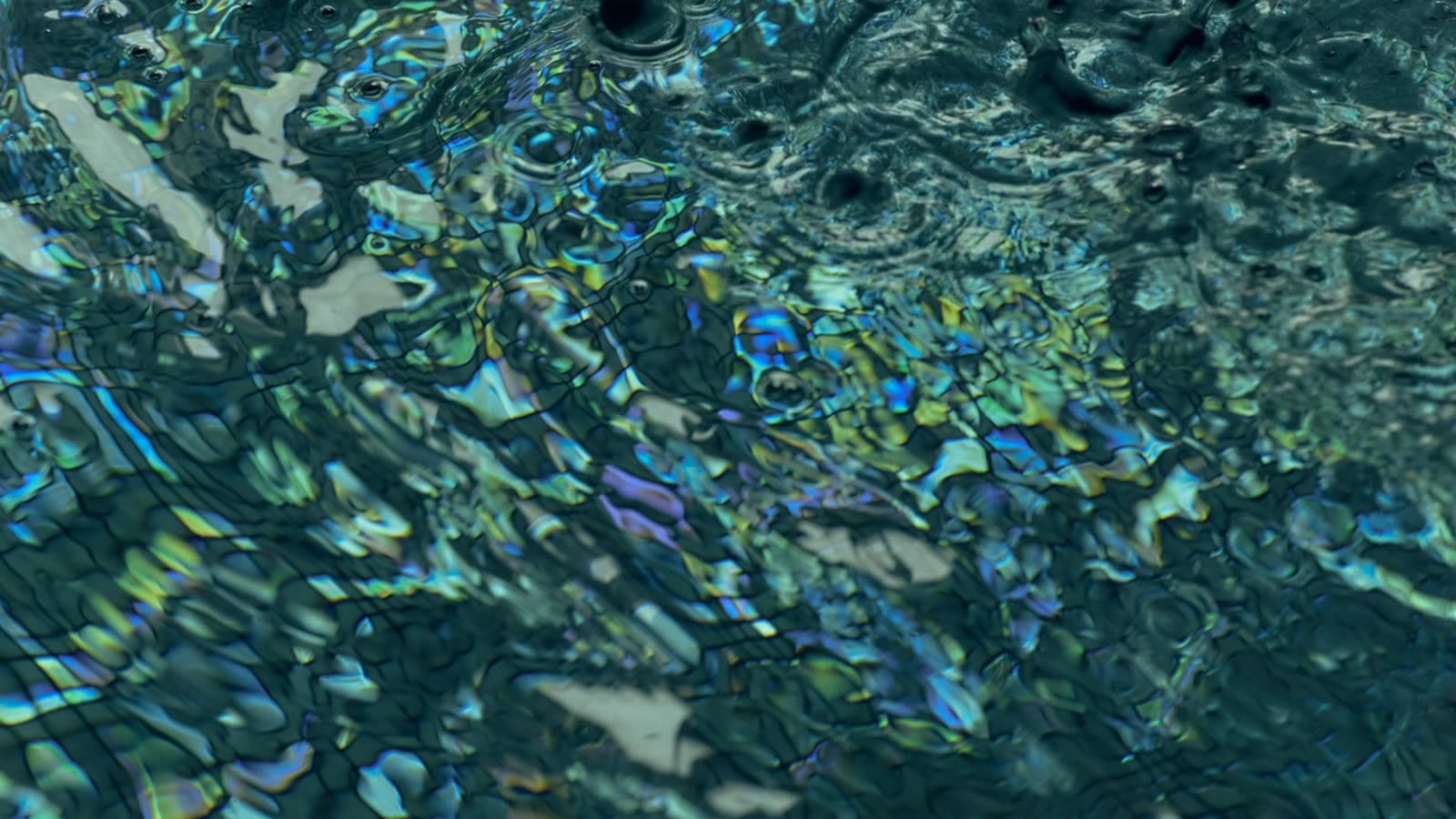 Light breaking across moving water